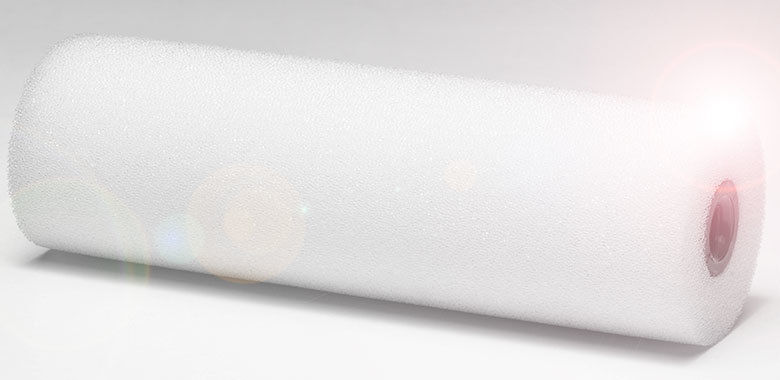 White foam roller for use in painting.