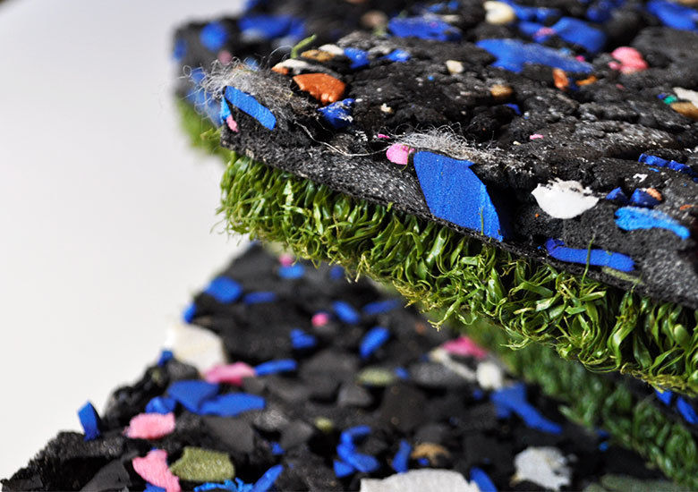 Multi colour cross-linked closed cell polyethylene foam with a green astroturf base.